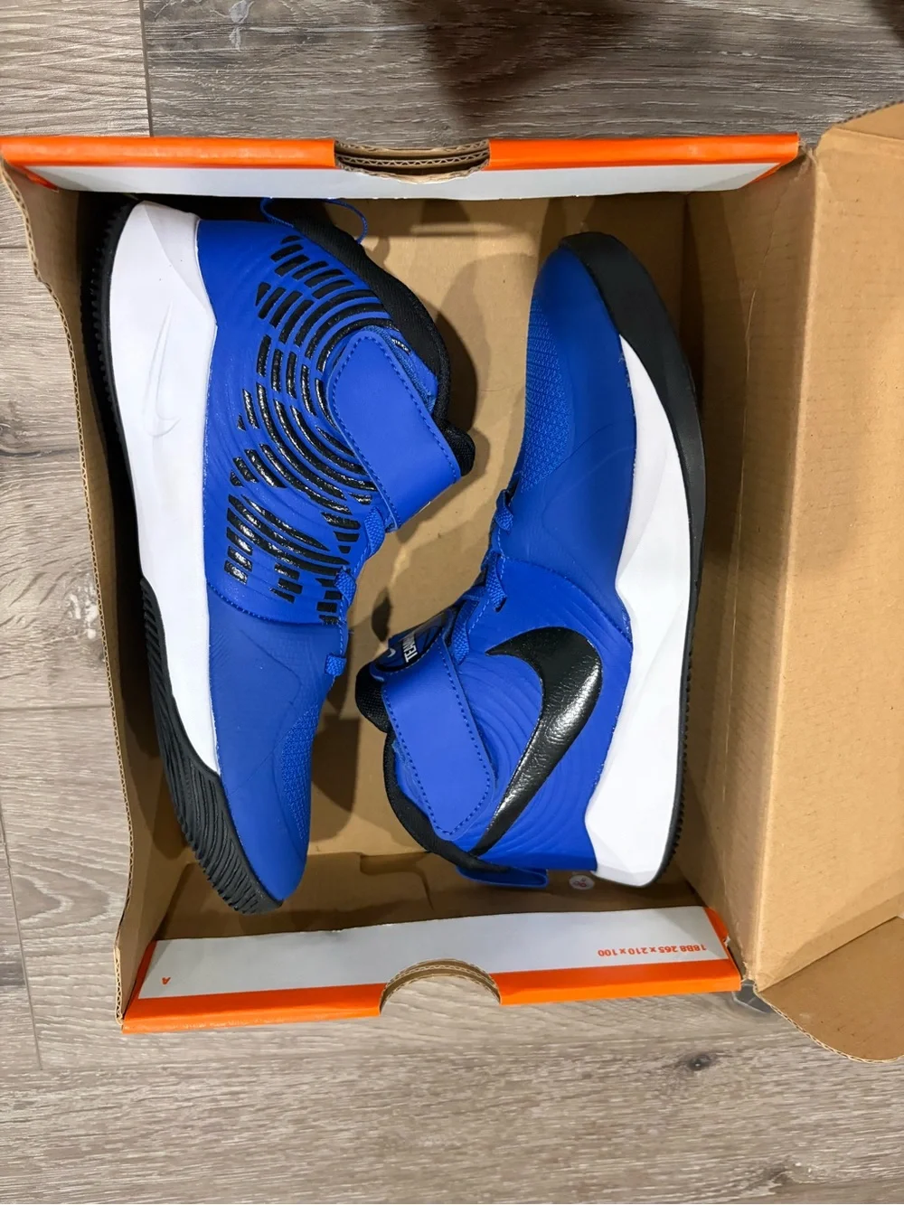 Nike Team Hustle Kids' Royal Blue High-Top Sneakers